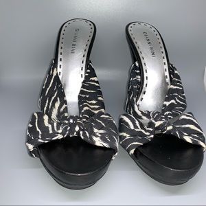 Cute zebra striped heeled sandals.